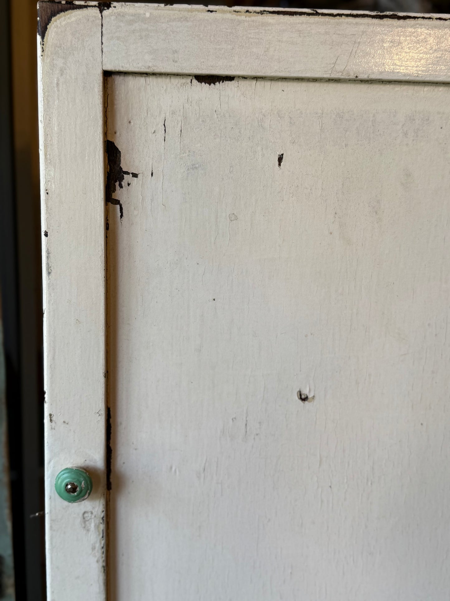 Old White Wall Cabinet with Green Handle
